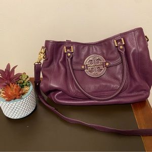 Tory Burch purple bag.